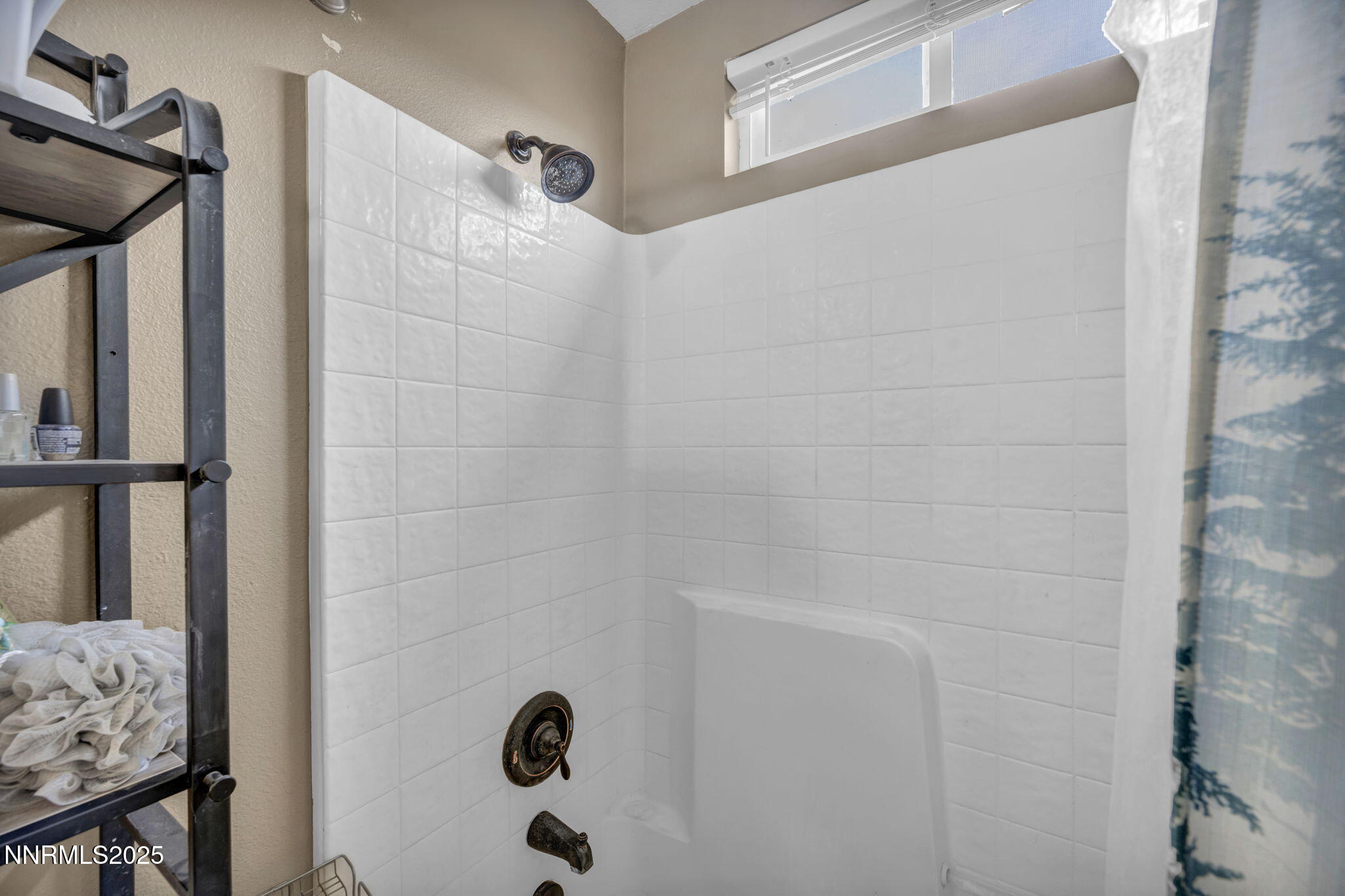572 Spur Way Fernley, NV 89408 - Photo 29 of 48 a bathroom with a shower