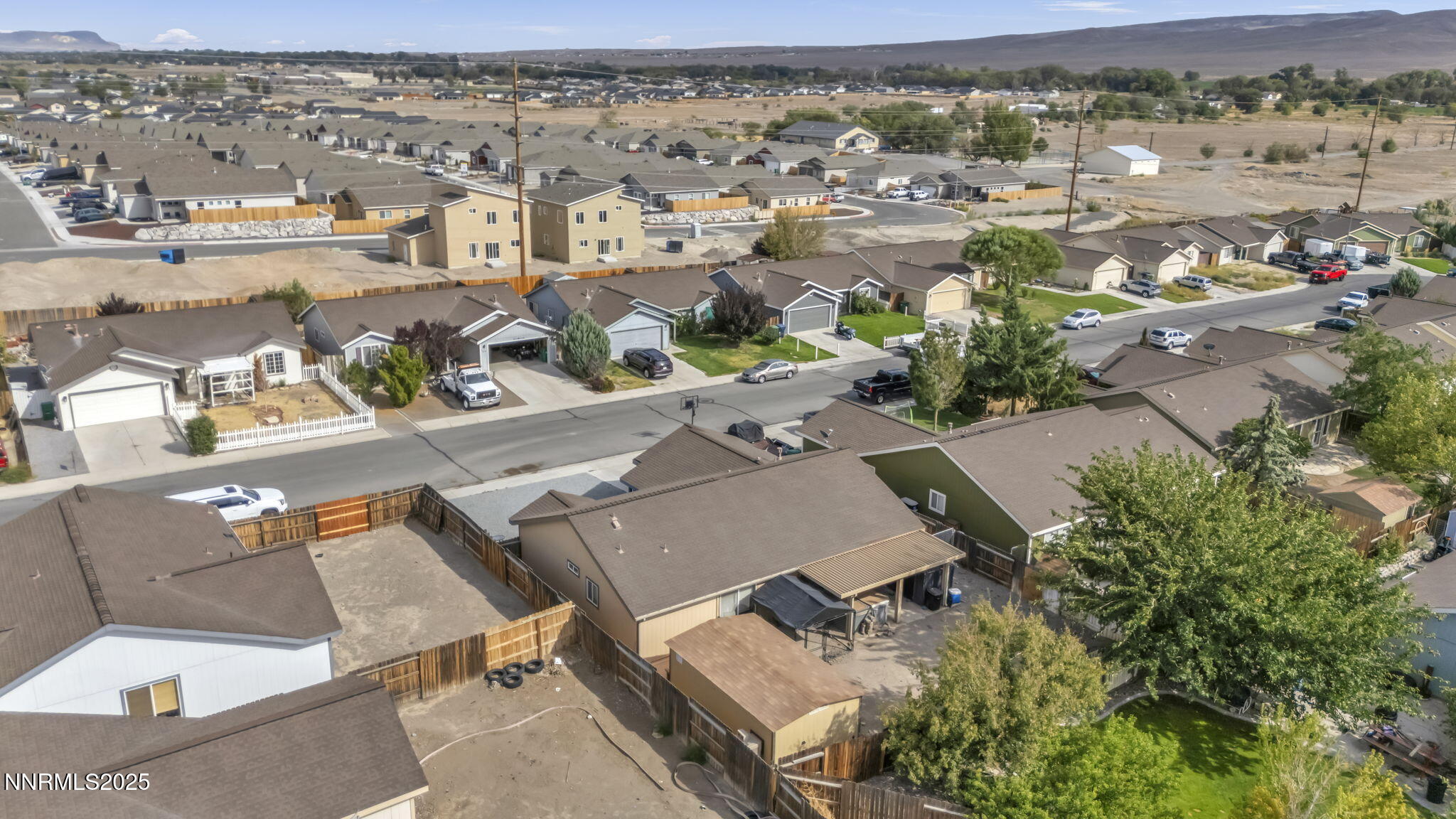 572 Spur Way Fernley, NV 89408 - Photo 40 of 48 an aerial view of residential houses with outdoor space