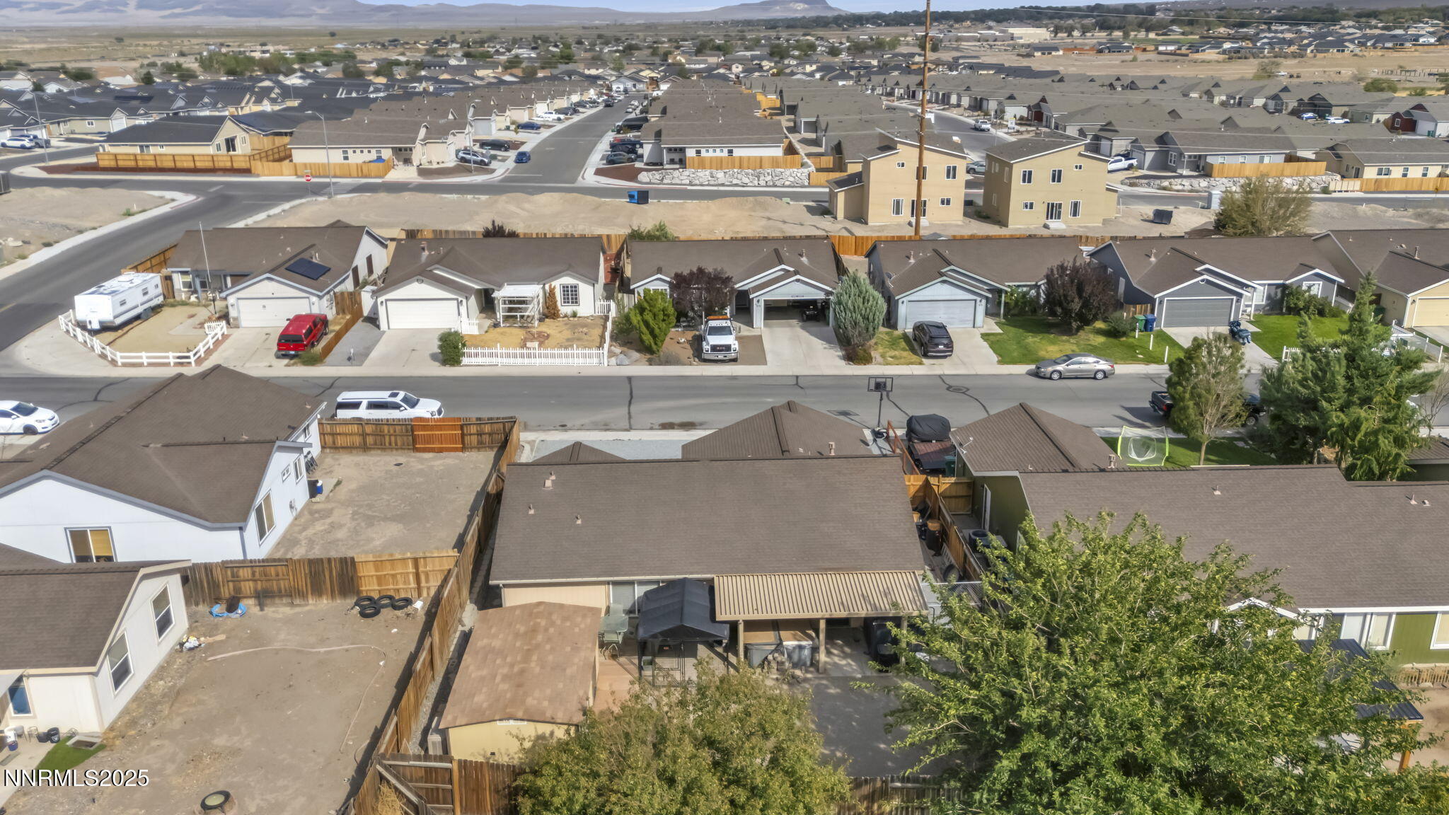 572 Spur Way Fernley, NV 89408 - Photo 44 of 48 an aerial view of residential houses with outdoor space
