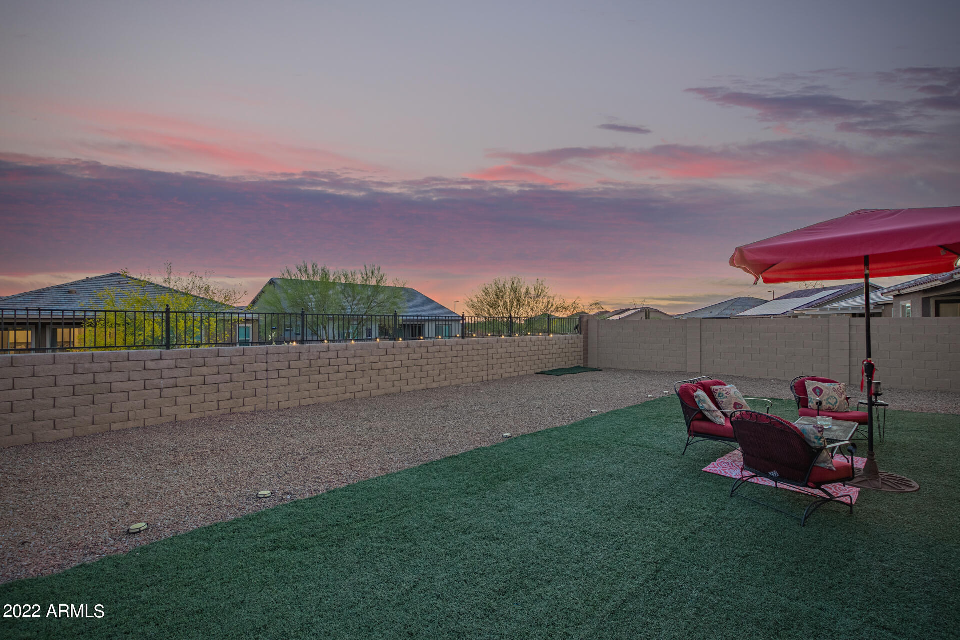 18545 West Chuckwalla Canyon Road Goodyear, AZ 85338 - Photo 37 of 66 Huge open backyard with view fence.