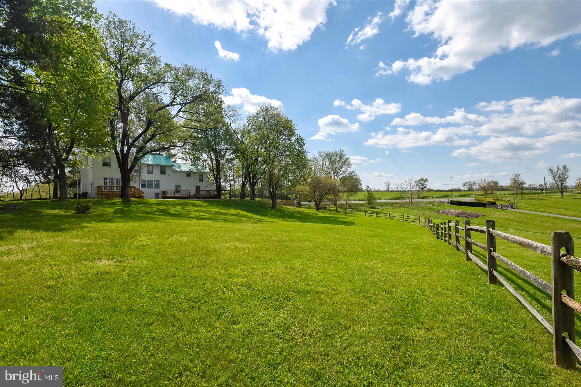 20209 St Louis Road Purcellville, VA 20132 - Photo 3 of 62 a view of a swimming pool with an outdoor space and seating area