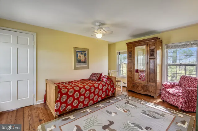 a bath tub sitting next to a window