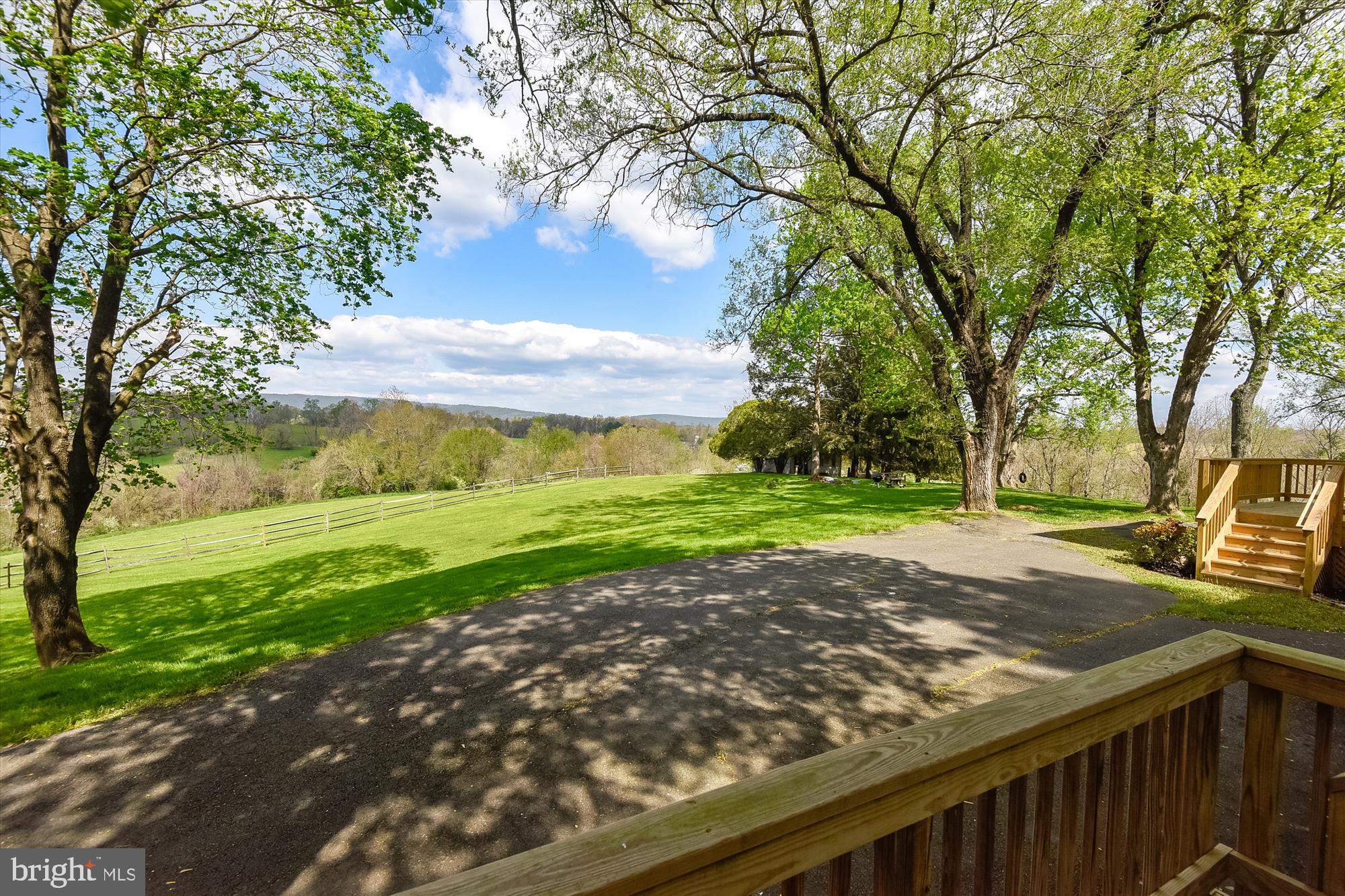 20209 St Louis Road Purcellville, VA 20132 - Photo 57 of 62 a view of a backyard with a garden