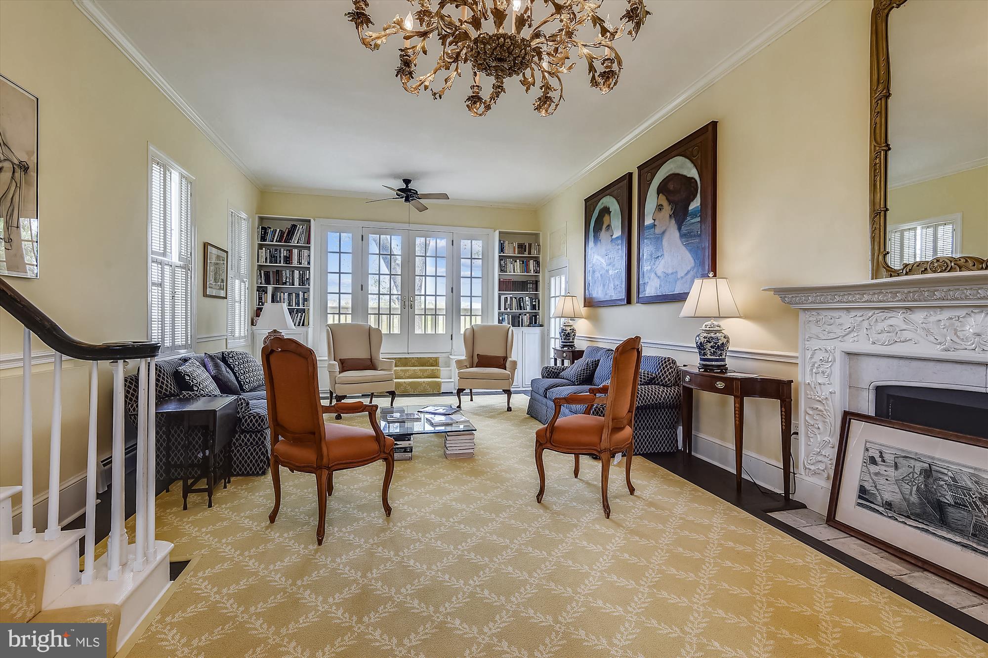 20209 St Louis Road Purcellville, VA 20132 - Photo 8 of 62 a living room with furniture a fireplace and a chandelier