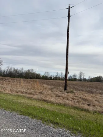 a view of a lake with a big yard