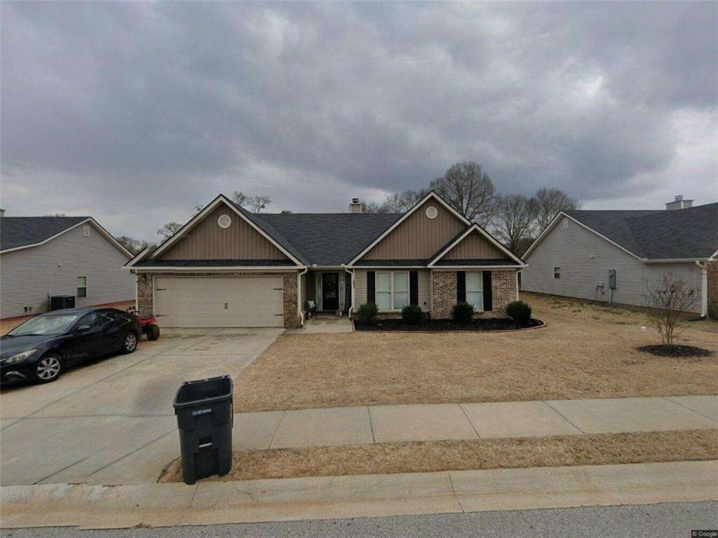 691 River Mist Circle Jefferson, GA 30549 - Photo 1 of 1 a front view of a house with a yard
