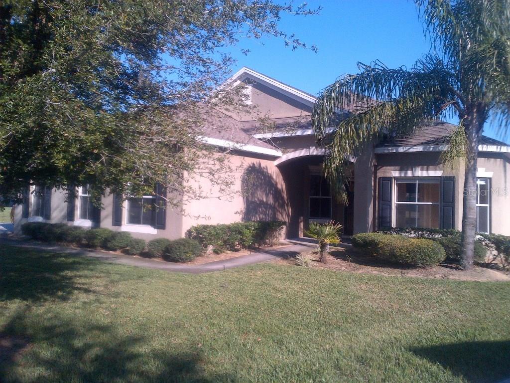 2549 Haskill Hill Road Apopka, FL 32712 - Photo 1 of 1 a view of a house with a patio