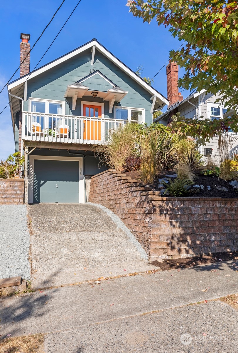 110 North 76th Street Seattle, WA 98103 - Photo 36 of 36 a front view of a house with a yard
