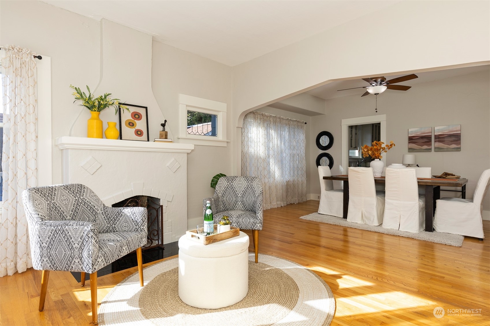 110 North 76th Street Seattle, WA 98103 - Photo 6 of 36 a living room with furniture and a fireplace