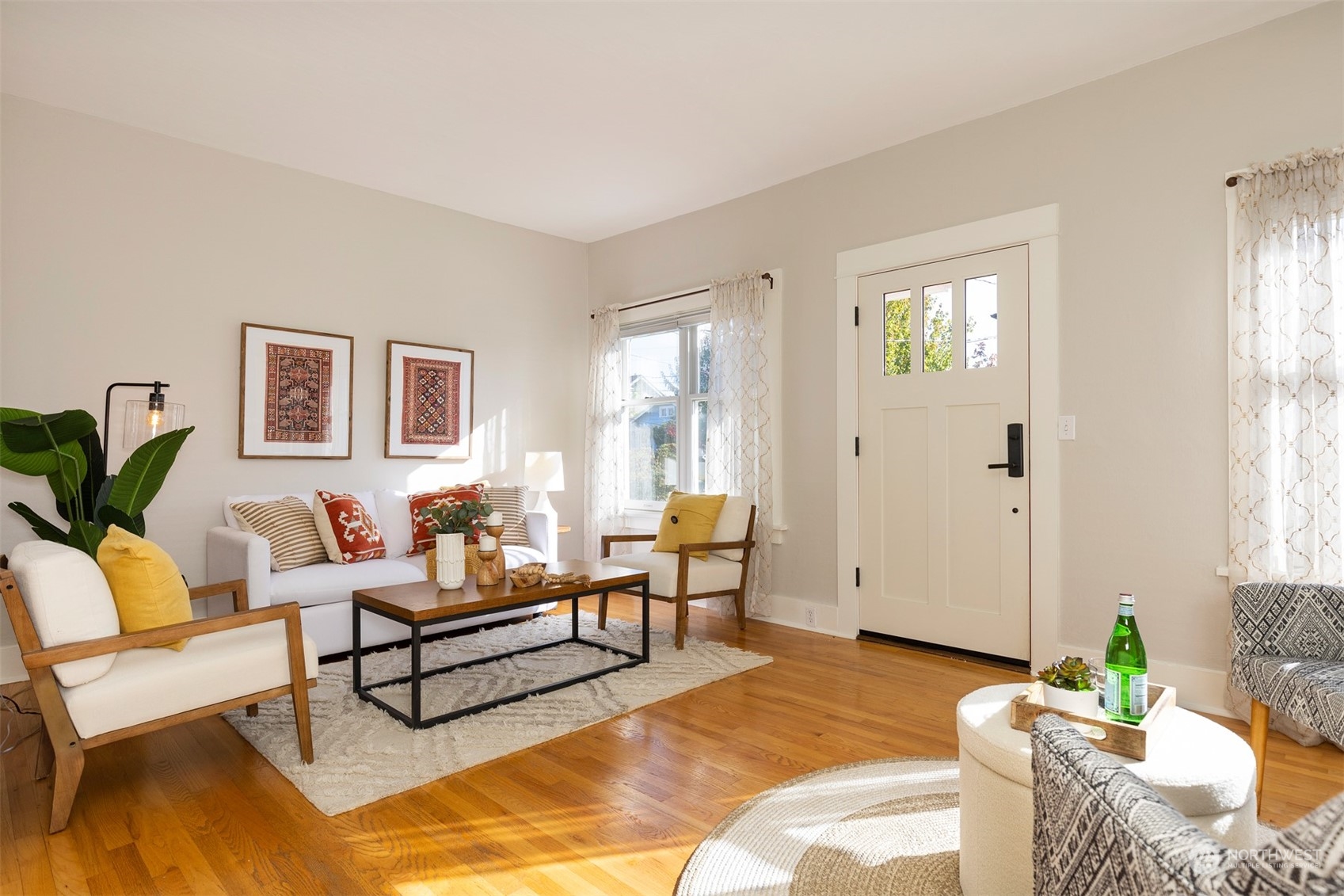 110 North 76th Street Seattle, WA 98103 - Photo 7 of 36 a living room with furniture and a window