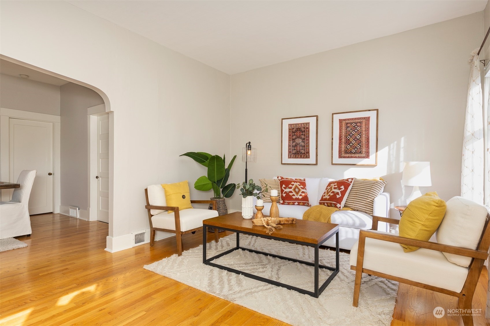 110 North 76th Street Seattle, WA 98103 - Photo 8 of 36 a living room with furniture and wooden floor