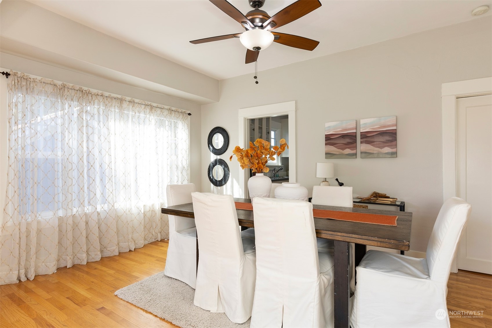 110 North 76th Street Seattle, WA 98103 - Photo 10 of 36 a living room with furniture and a window