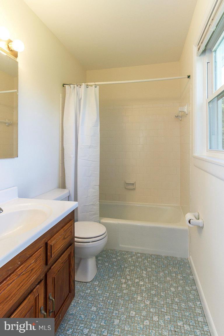 17615 Grace Road Hampstead, MD 21074 - Photo 14 of 30 a bathroom with a sink a toilet and shower