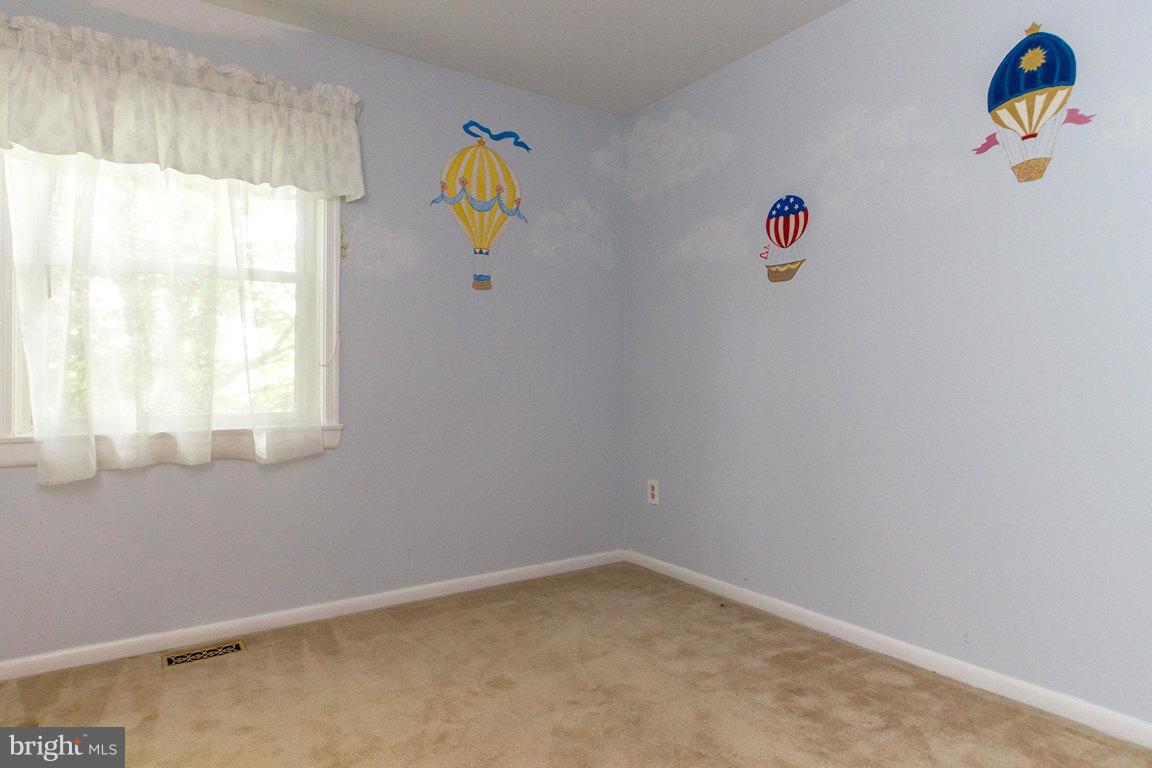 17615 Grace Road Hampstead, MD 21074 - Photo 17 of 30 a white wall with a window