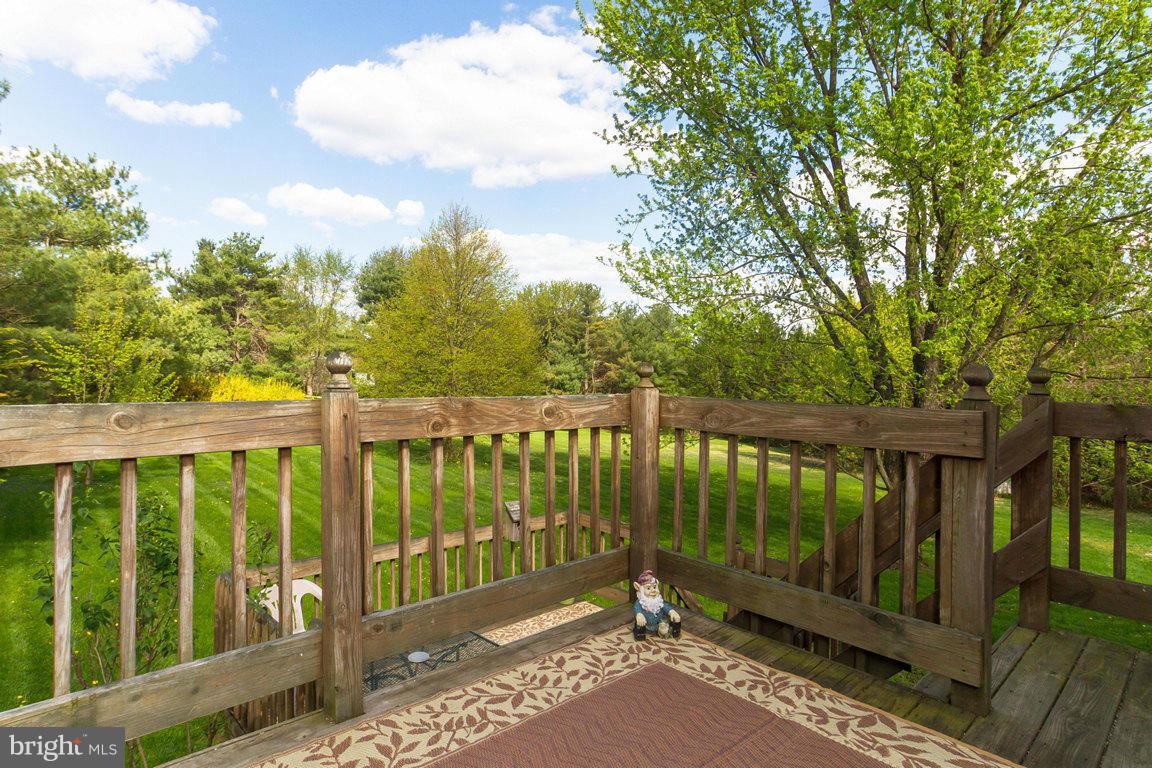 17615 Grace Road Hampstead, MD 21074 - Photo 20 of 30 a view of a wooden deck with a backyard