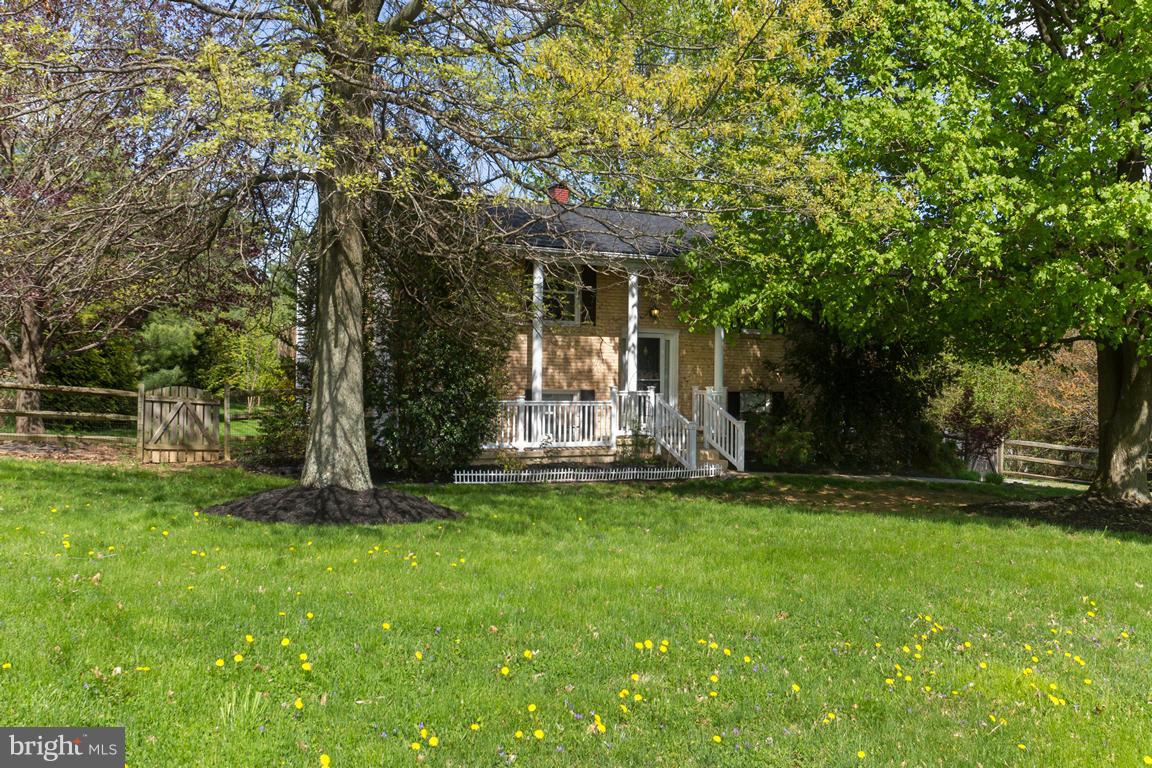 17615 Grace Road Hampstead, MD 21074 - Photo 28 of 30 a front view of a house with a garden