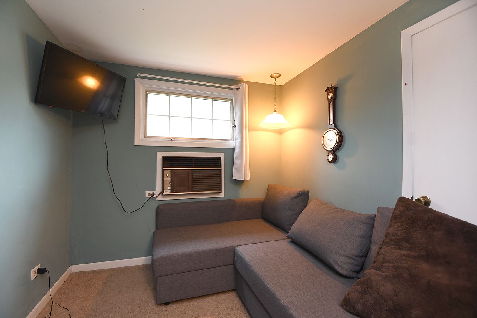 2114 Evans Road Flossmoor, IL 60422 - Photo 31 of 31 a living room with furniture and a fireplace