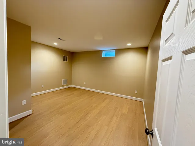 a bathroom with a toilet a sink and shower
