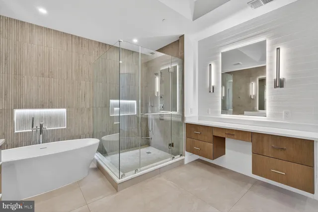 a bathroom with a bathtub and a sink