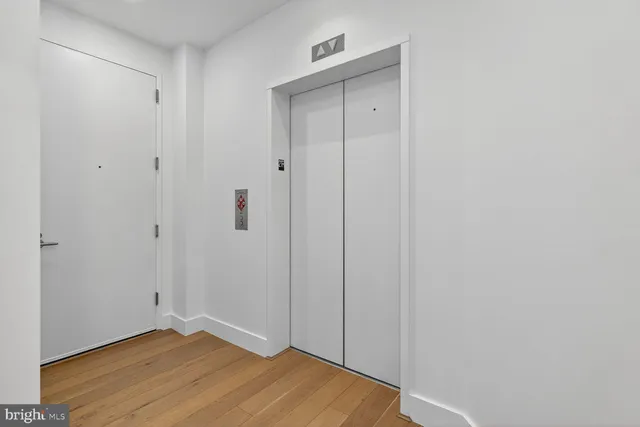 a view of small space with wooden floor