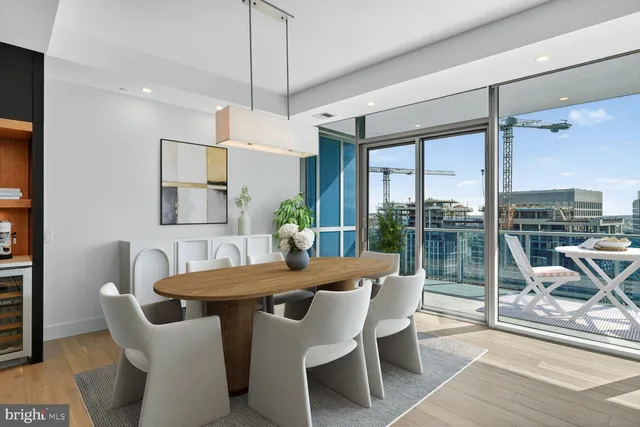 a view of a dining room with furniture window and outside view
