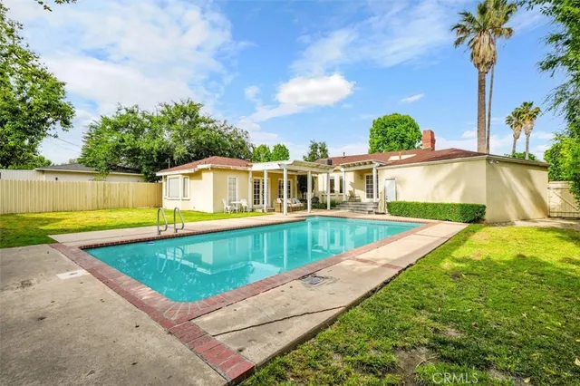 swimming pool with outdoor seating