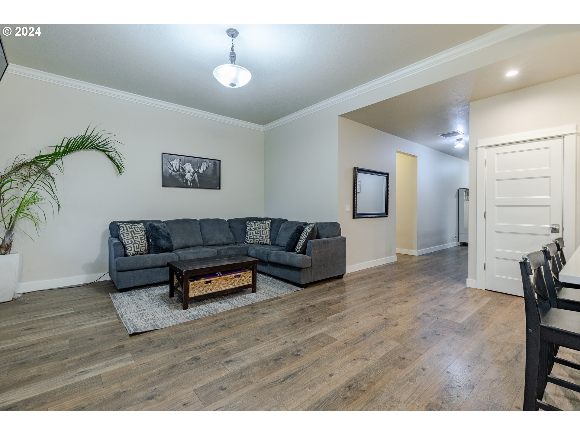 1026 West Olympic Street Springfield, OR 97477 - Photo 14 of 31 a living room with furniture and a wooden floor