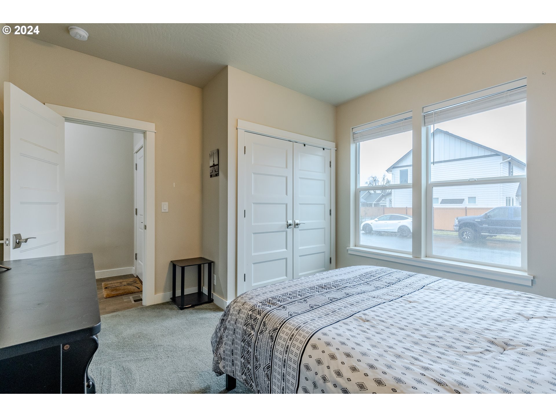 1026 West Olympic Street Springfield, OR 97477 - Photo 24 of 31 a bedroom with a bed and a window