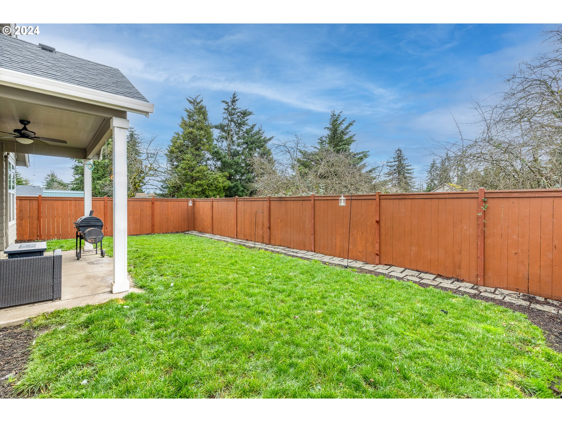 1026 West Olympic Street Springfield, OR 97477 - Photo 30 of 31 a view of a backyard with a garden