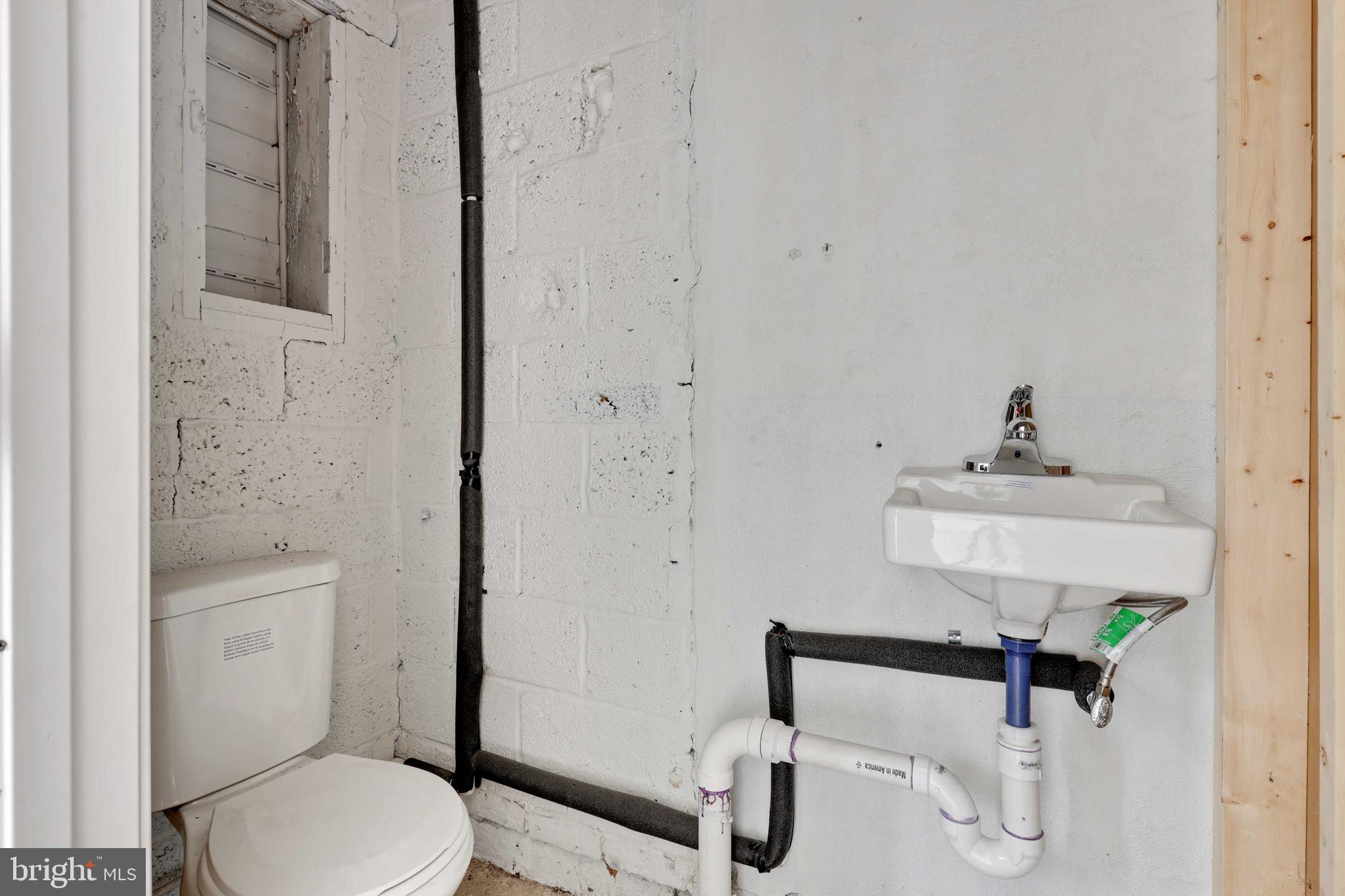 4414 Belair Road Baltimore, MD 21206 - Photo 51 of 55 Garage powder room