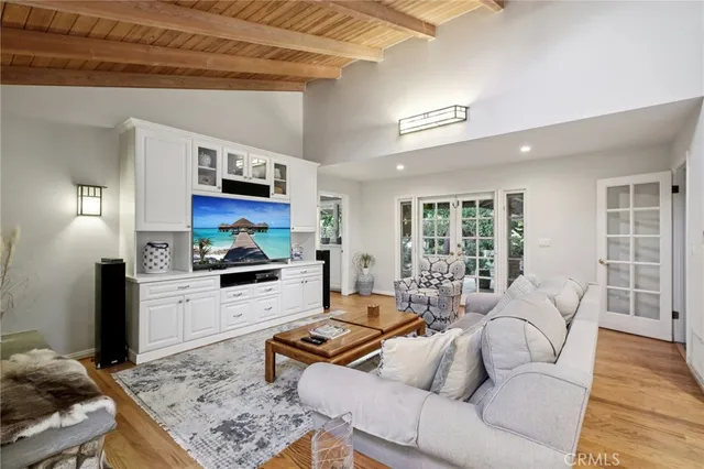 a kitchen with stainless steel appliances kitchen island granite countertop a table and chairs