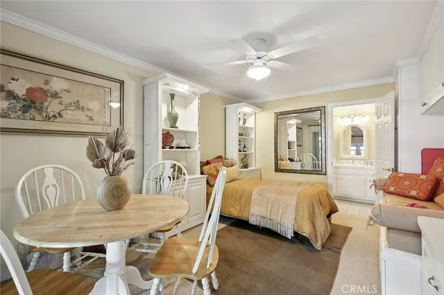 a large bathroom with a granite countertop sink a mirror and shower