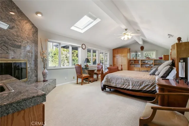 a bathroom with a double vanity sink mirror and shower