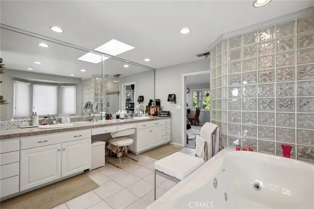 a room with gym equipment and windows