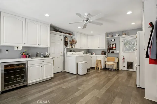 an aerial view of a house with a yard and garden
