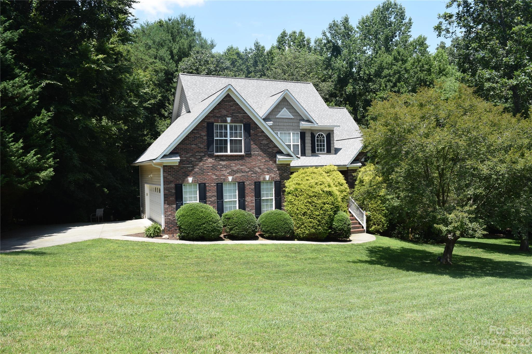 6521 Emory Drive Hickory, NC 28601 - Photo 1 of 28 a front view of a house with a yard