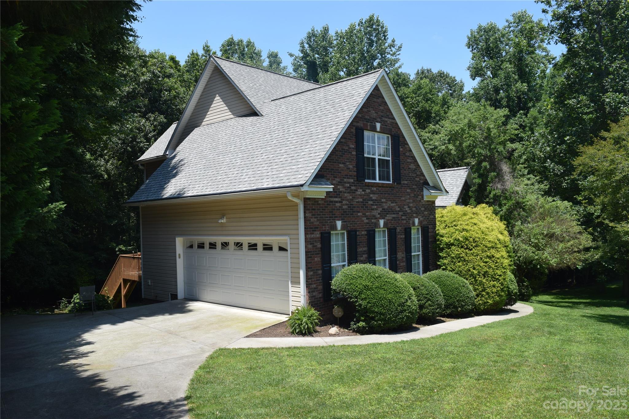 6521 Emory Drive Hickory, NC 28601 - Photo 2 of 28 a front view of a house with a yard and garage