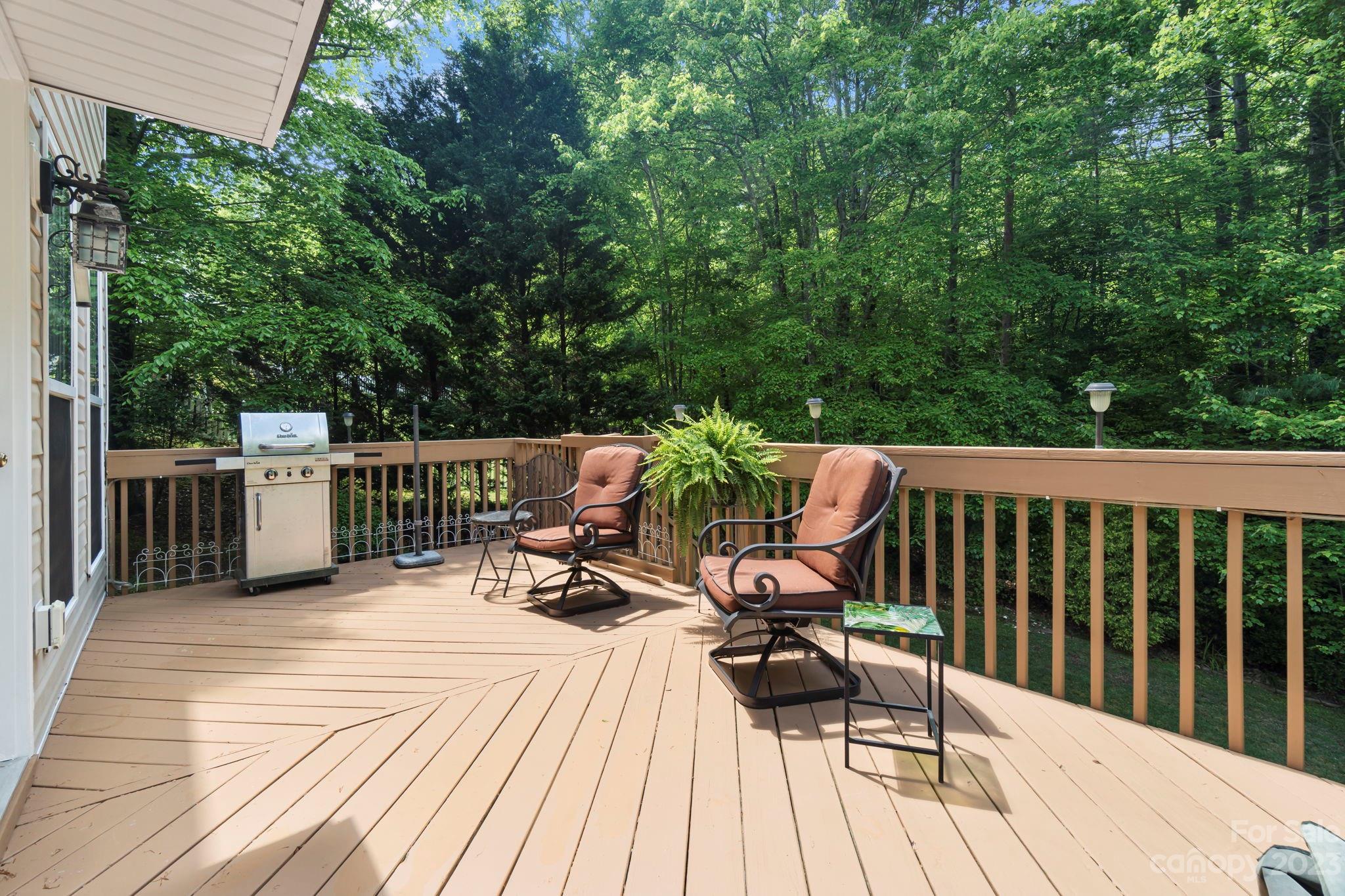 6521 Emory Drive Hickory, NC 28601 - Photo 26 of 28 a view of roof deck with chairs and wooden floor