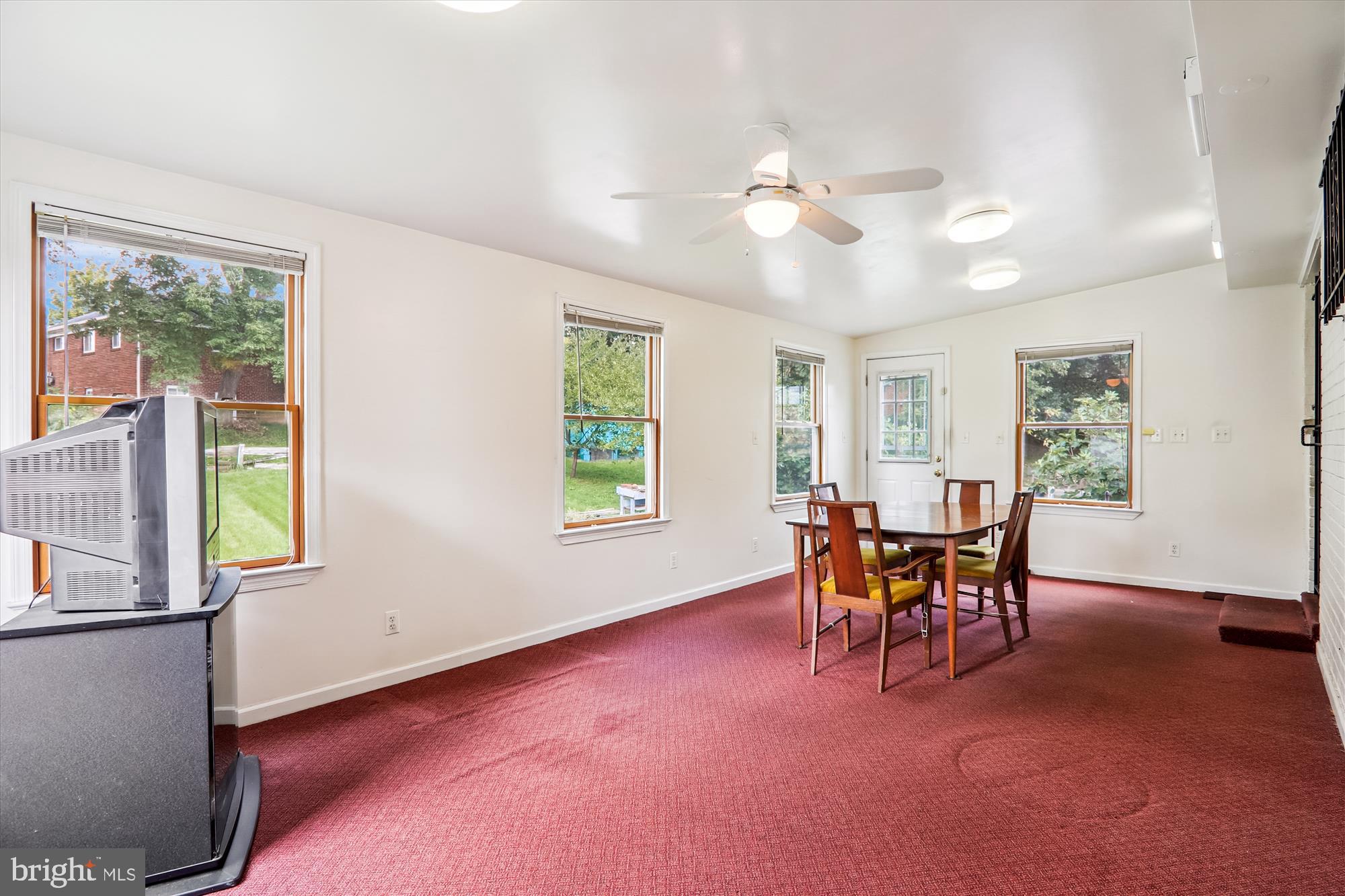 9507 Adelphi Road Silver Spring, MD 20903 - Photo 17 of 41 a dining room with furniture and window