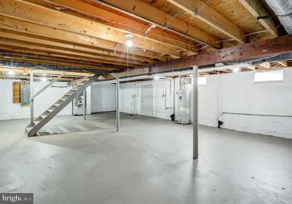 a view of a room with wooden walls