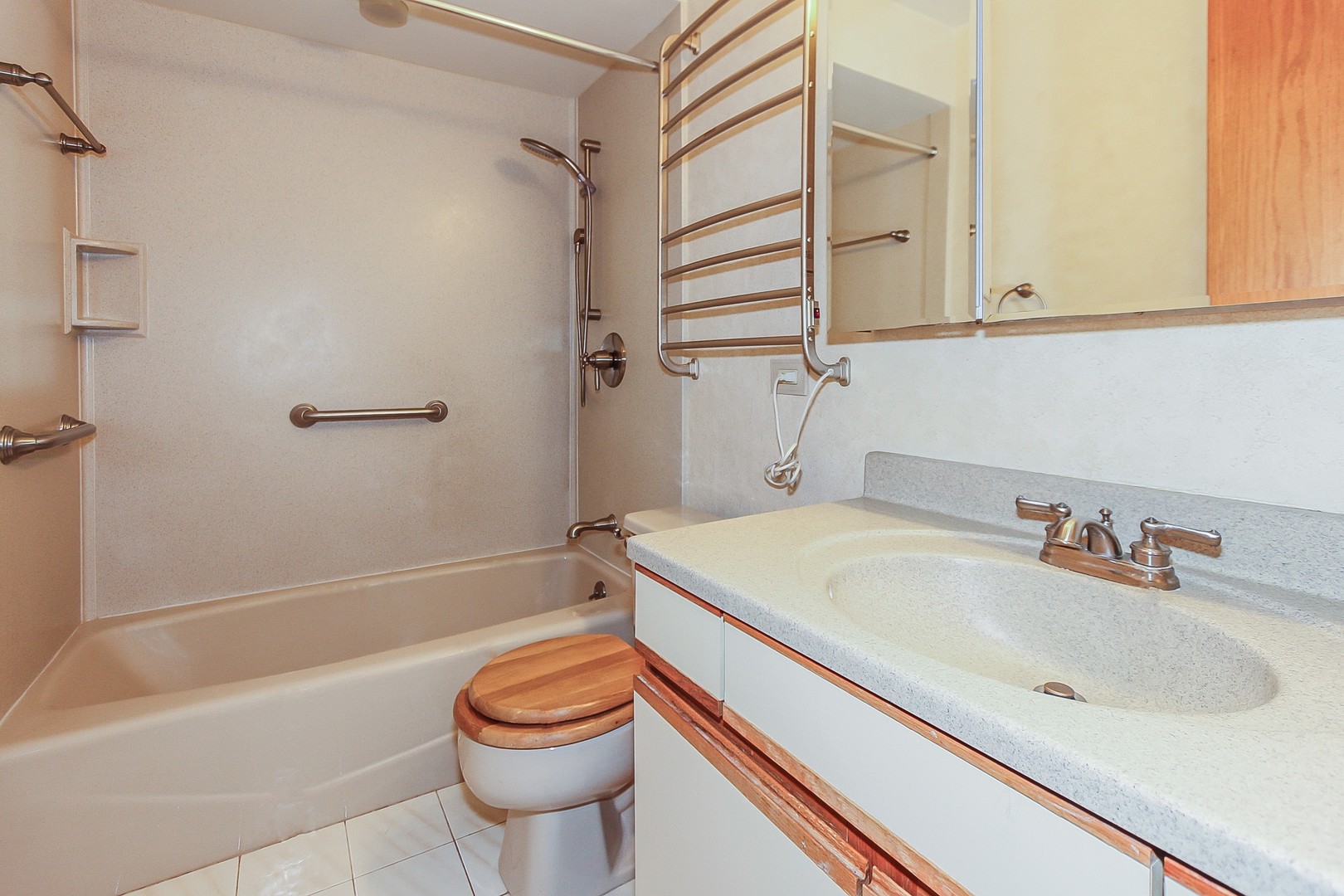 70 South Dee Road, Unit A Park Ridge, IL 60068 - Photo 13 of 20 a bathroom with a sink a toilet and shower