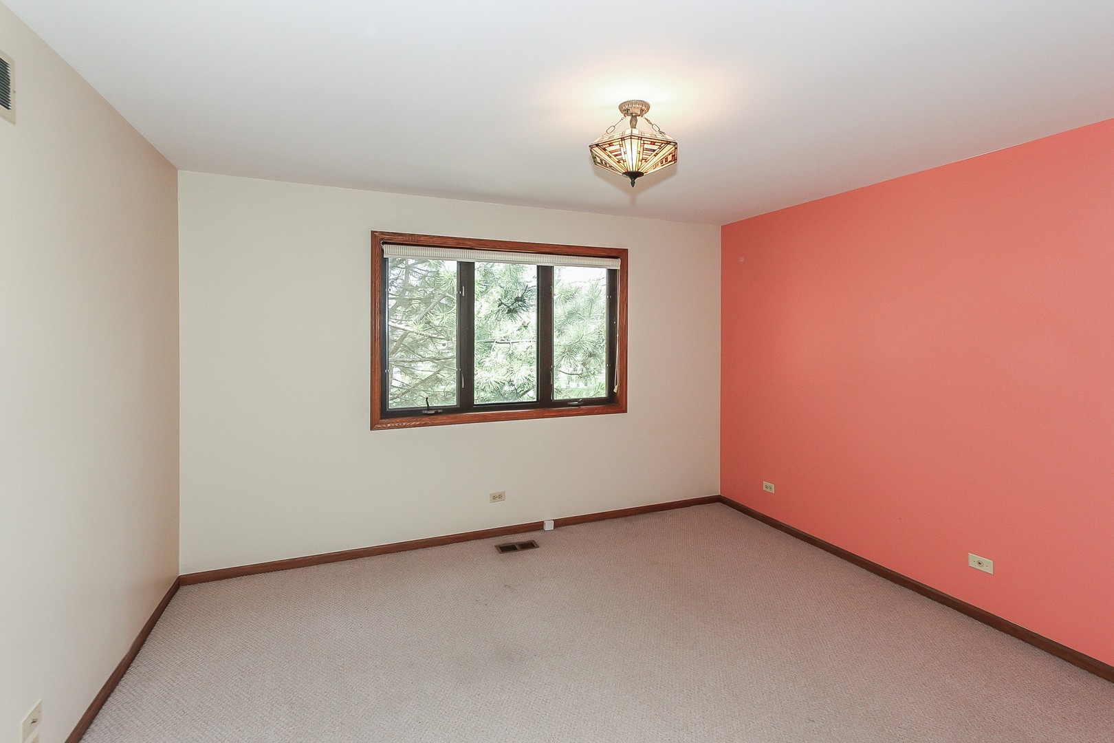 70 South Dee Road, Unit A Park Ridge, IL 60068 - Photo 14 of 20 an empty room with a window