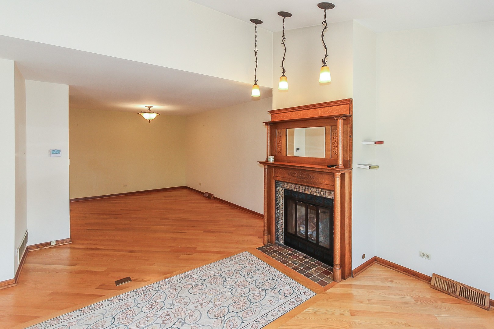 70 South Dee Road, Unit A Park Ridge, IL 60068 - Photo 4 of 20 a view of a livingroom with a fireplace