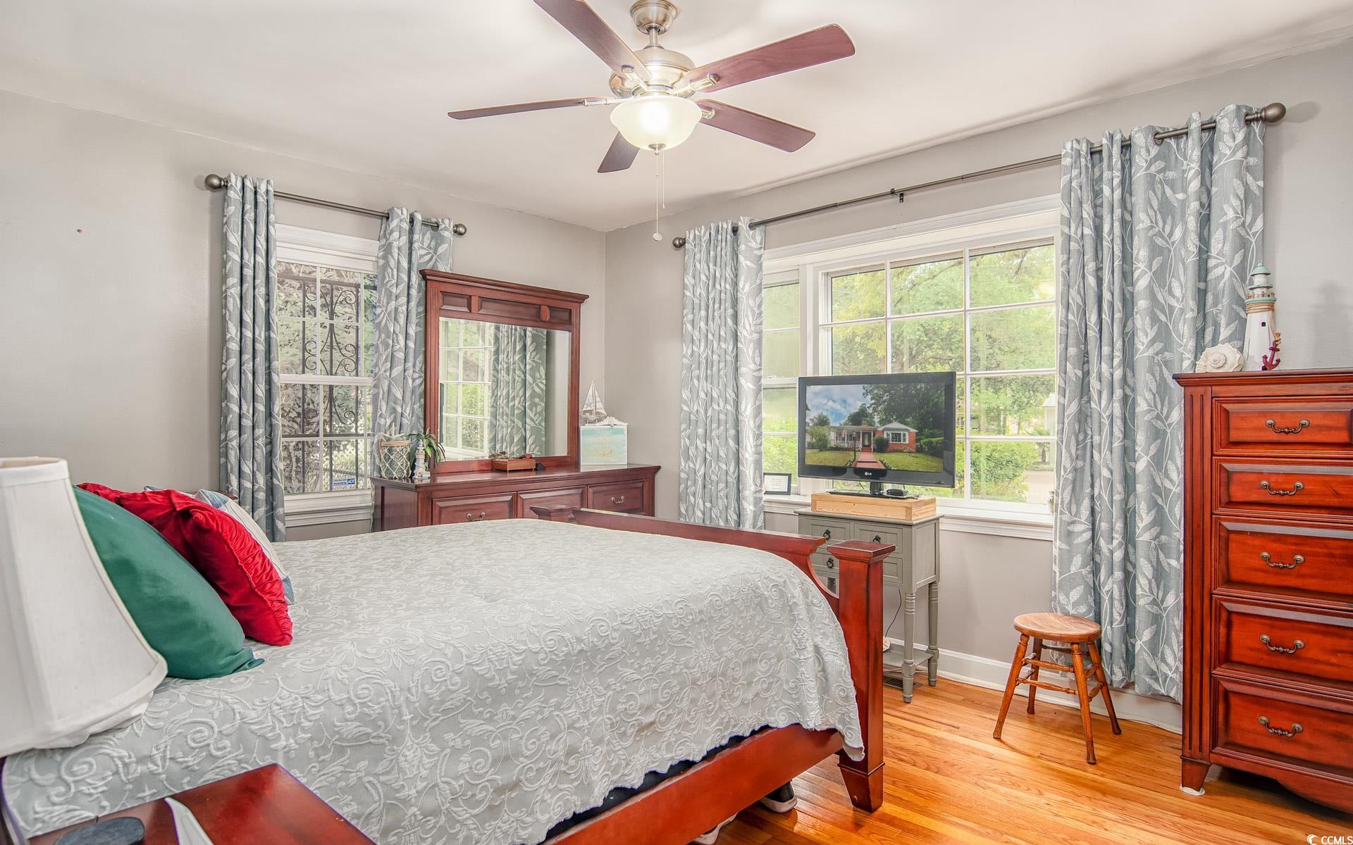 310 St James Street Georgetown, SC 29440 - Photo 14 of 25 Bedroom with light wood finished floors and ceiling fan