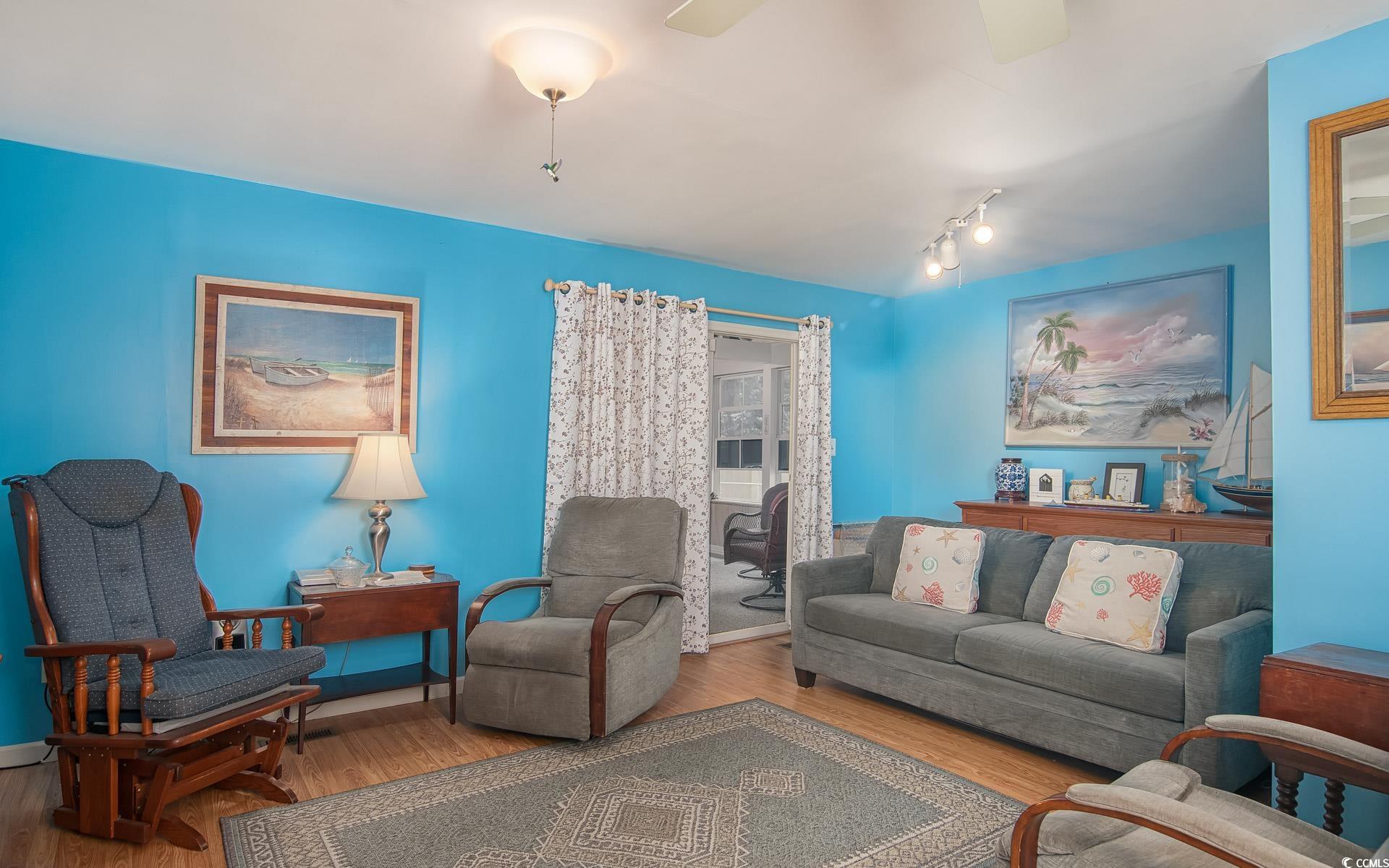 310 St James Street Georgetown, SC 29440 - Photo 15 of 25 Sitting room with wood finished floors and baseboards