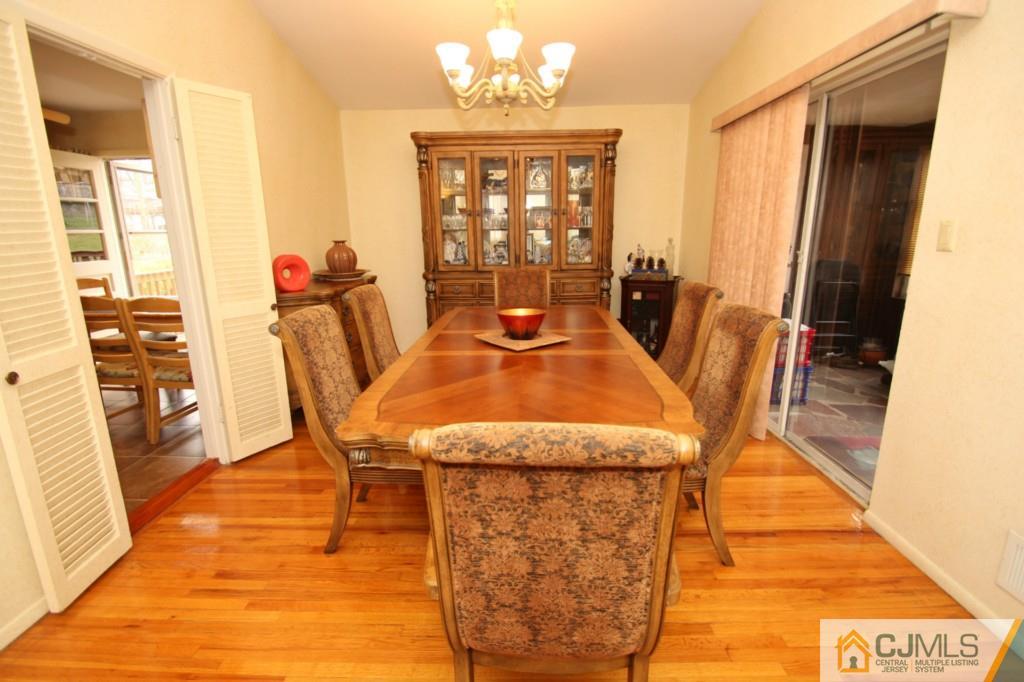 16 Gales Road Edison, NJ 08837 - Photo 4 of 25 a view of a dining room with furniture window and outside view