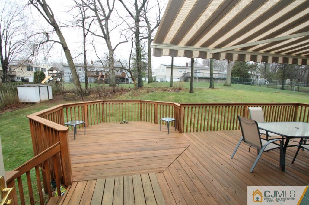 16 Gales Road Edison, NJ 08837 - Photo 7 of 25 a view of balcony with deck and wooden floor