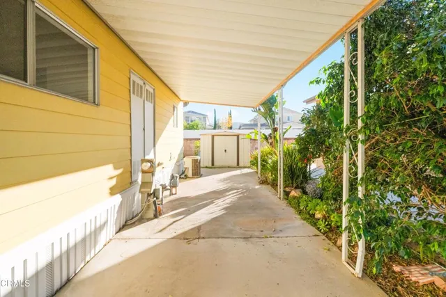 a spacious bathroom with a shower and mirror