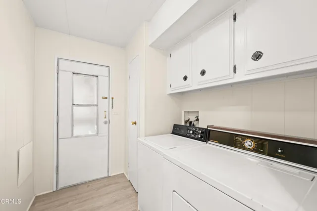 a view of a house with a street