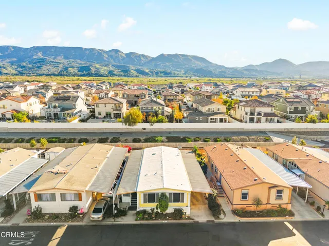a view of city with ocean